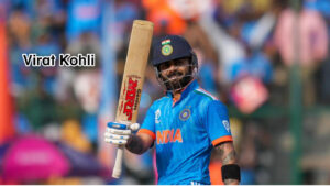 India’s batter Virat Kohli celebrates after scoring a half-century & virat Kohli Top 1st Bastman in World Cup 2023